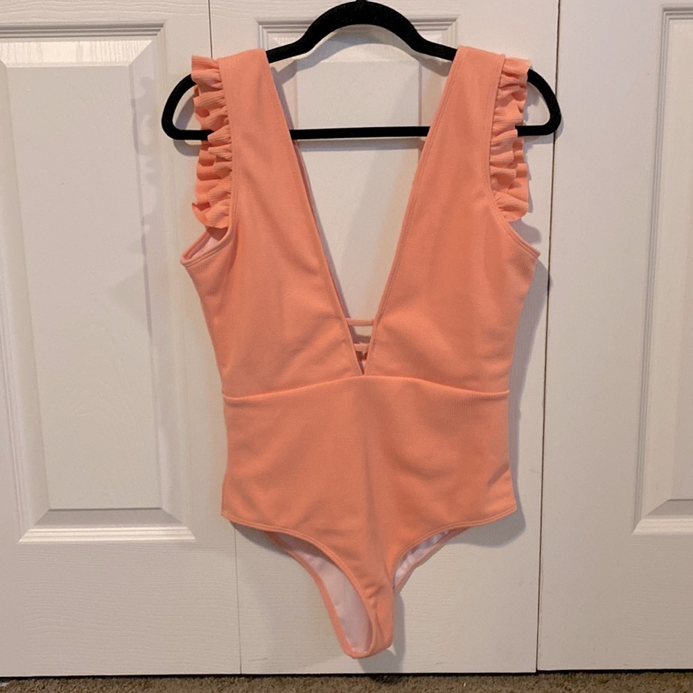 One piece swimsuit. Ruffle shoulders, deep V neckline. Removable padding. - Picture 5 of 5